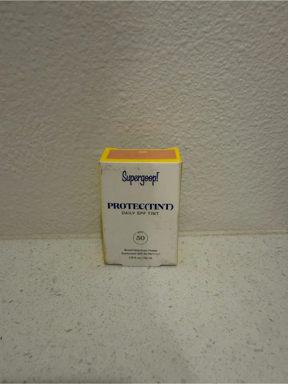 Supergoop! Protect(Tint) Daily SPF Tint - Yellow and White Packaging
